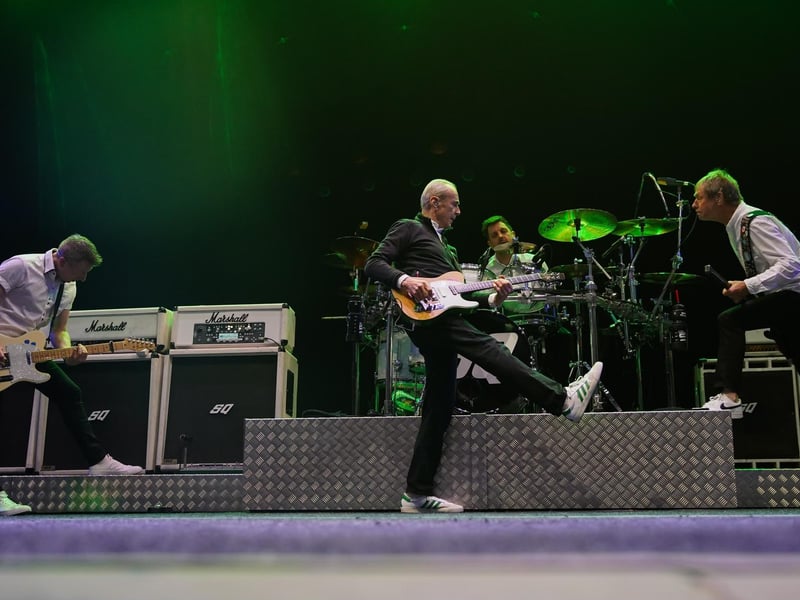 Francis Rossi and Status Quo entertain the audience.