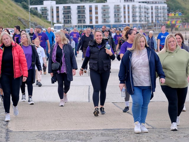 Walkers near the North Bay.
picture: Richard Ponter