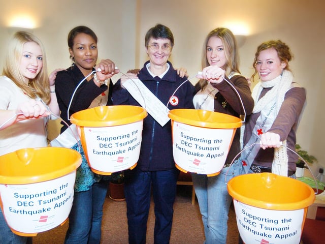 Tsunami fundraising students from Scarborough Sixth Form College present the Red Cross with £305. From left: Sarah Hoff, Sayda Musa, Ruth Dale of the Red Cross, Melissa Graham and Sarah Ward.