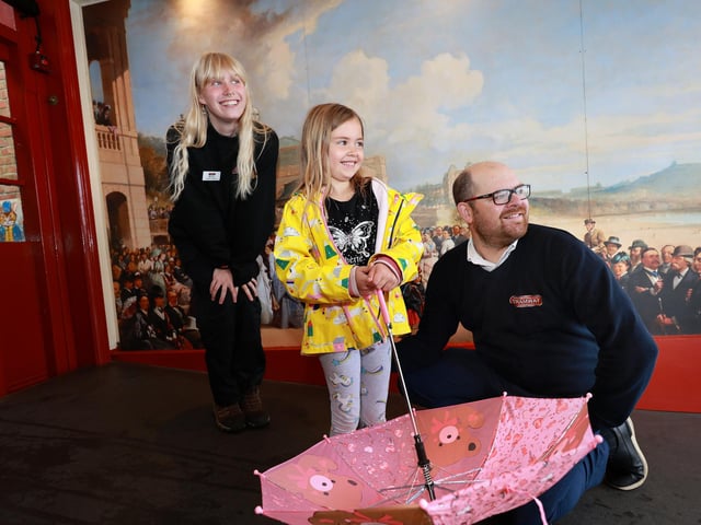 Erin enjoys the visit guided by dad Colin and staff member Roxy Wilkinson