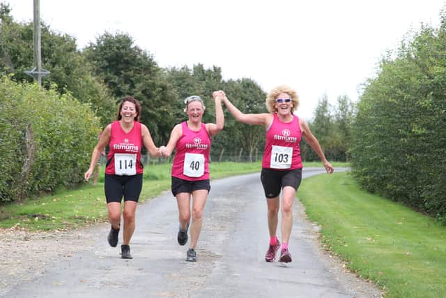 A trio enjoy the first-ever Wold Top 10K