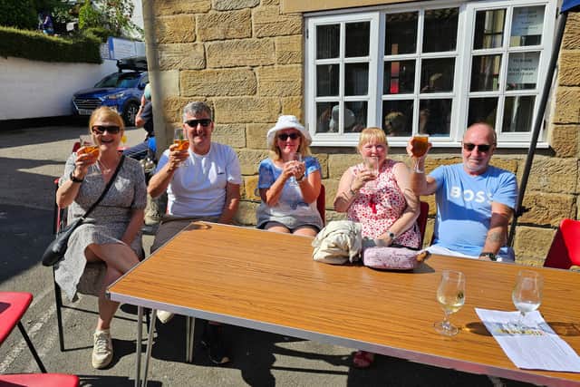 Enjoying a drink (or two) outside at the Whitby Lions Beer Festival.