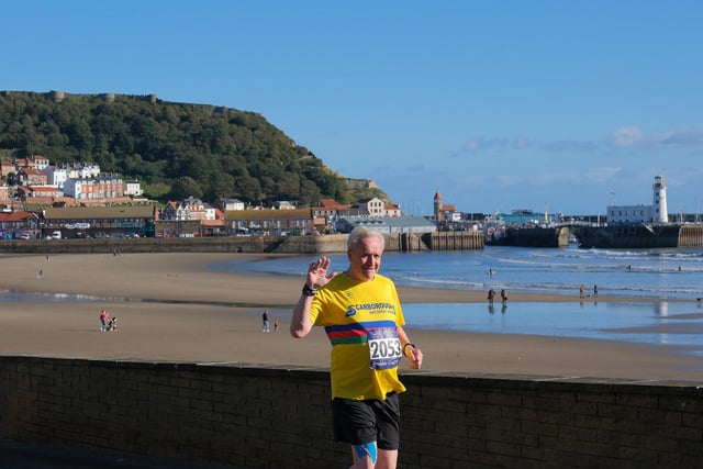 A home runner is all smiles at the Scarborough 10k pic Richard Ponter