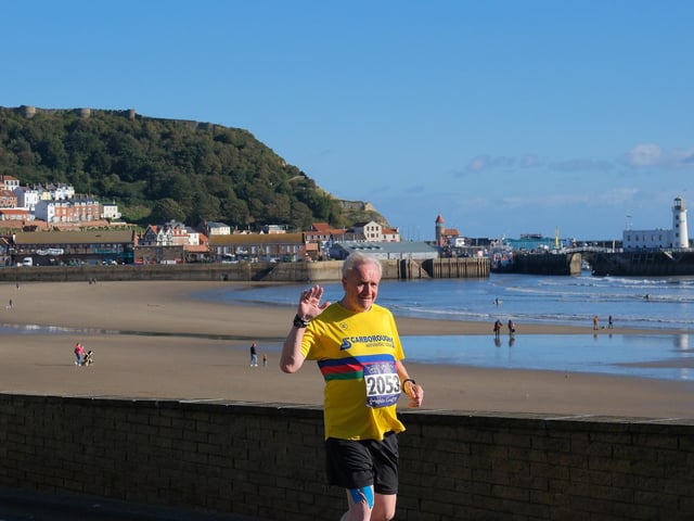 A home runner is all smiles at the Scarborough 10k pic Richard Ponter