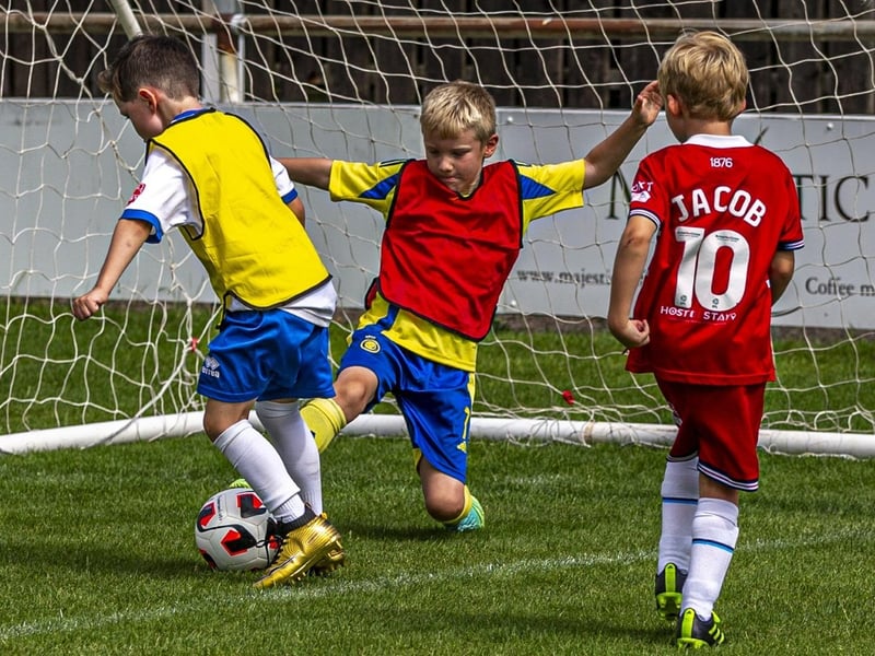 Action from the youngsters' football tournament. photo: Brian Murfield
