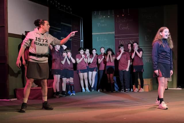 Miss Trunchbull (Elliot Burnley) and Matilda (Betsy Brewis)