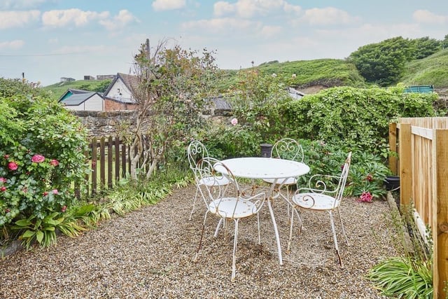The rear of the property has a charming garden with rural views. The perfect place relax when the weather permits.