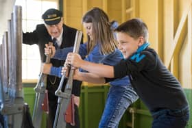 Youngsters visit a signal box.