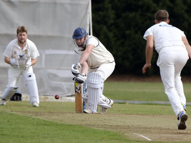 Opening bat Archie Graham fends away a Rich Malthouse delivery