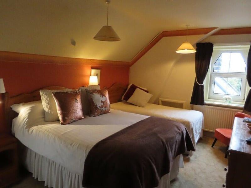 One of the hotel's nine rooms, eight of which are en suite.