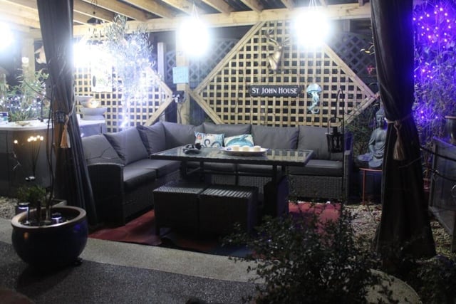 A pergola with seating area.