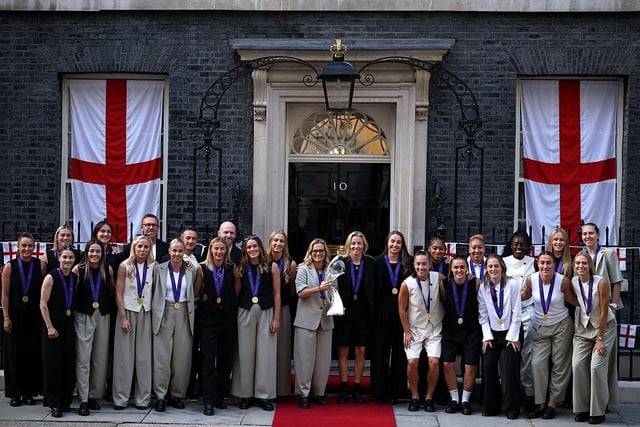 The England squad wearing their winners' medals arrive in Downing Street for a reception at No 10, hosted by Deputy Prime Minister Angela Rayner, in celebration of England's victory over Spain. Photo by Dan Kitwood/Getty Images