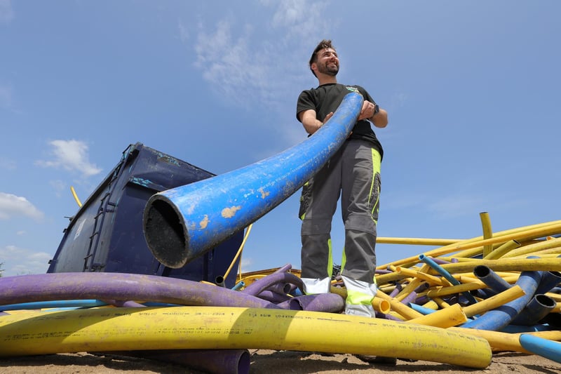 Henry Harrison working at the recycling site