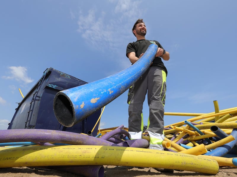 Henry Harrison working at the recycling site