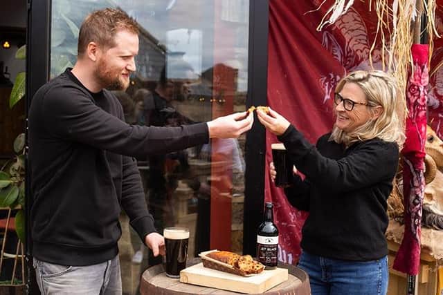Richard Wells, Whitby Brewery and Jane Botham, Bothams of Whitby trying their collaborative Whitby Beer Brack.