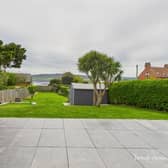 The rear garden of the Robin Hoods Bay property, with spectacular views beyond.