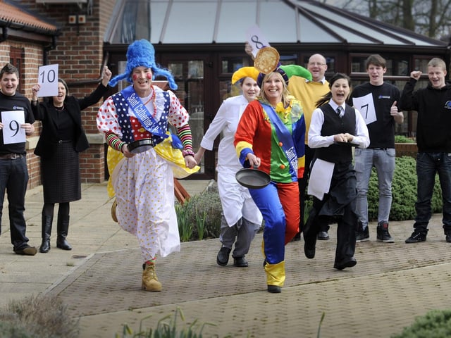 St Catherines Hospice fundraisers 'Dame' David Marshall and jester Louise Leah get ready for the Pancake races
Looking on, with their scorecards are, student Nick Jenkinson, Mary Turnbull from Scarborough Council, Toni Brewer, Sophie Jordan, catering tutor Ryan Sperry, George Elliott and Kyle Ireland.  - 04/03/11