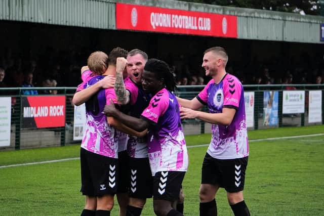 Whitby players celebrate a goal in the win at Quorn. Photo by Owen Cox