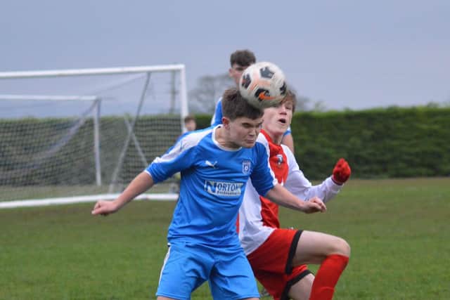 Heslerton Under-15s (blue) in action against Copmanthorpe
