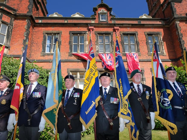 The standard bearers line up