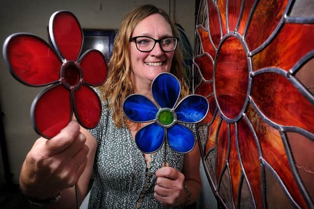 Sleights-based stained glass artist Janet Fraser with some of her work.picture: Richard Ponter