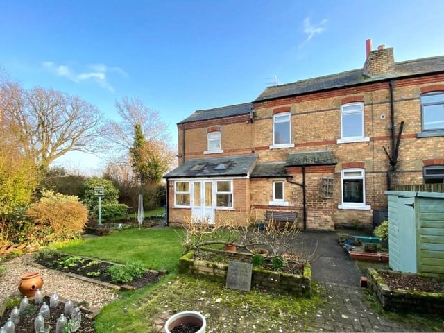 A rear view of the four bedroom cottage from the garden.