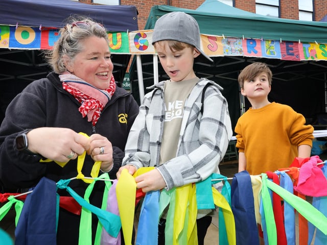 Dawn Threadgold working with a young visitor