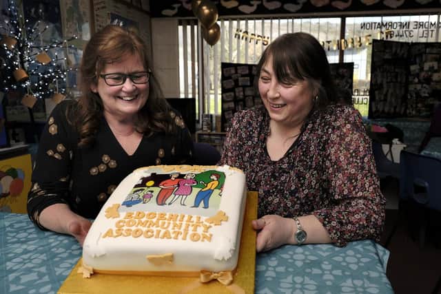 Cllr Liz Colling and Sevices Manager Debbie Brown with the anniversay cake