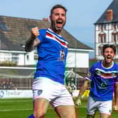 Tymon celebrates his crucial goal with Layton Watts in the 1-0 win at home to Warrington Rylands. Photo by Brian Murfield.
