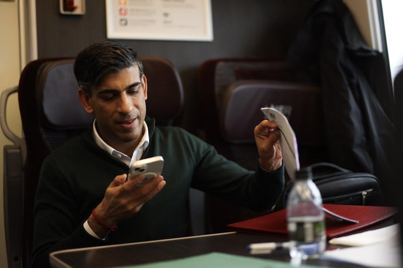 Prime Minister Rishi Sunak works on the train on his way to the Construction Skills Village in Scarborough. Picture by Simon Dawson / No 10 Downing Street.