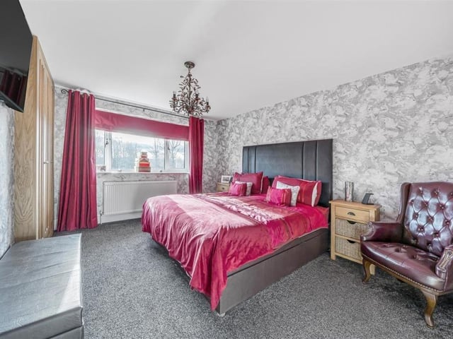 One of the property's three double bedrooms.