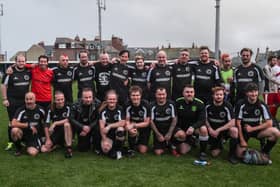 At Whitby Goth Weekend the Real Gothic FC team gets ready for their football match (2017).