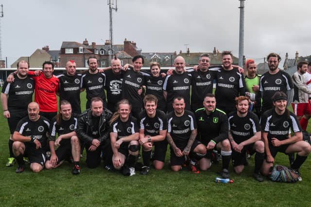 At Whitby Goth Weekend the Real Gothic FC team gets ready for their football match (2017).