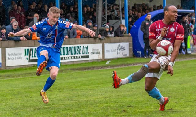 Whitby Town's Harry Green on the attack during the 1-0 home loss against South Shields, who claimed promotion as champions with this win. PHOTOS BY BRiAN MURFIELD