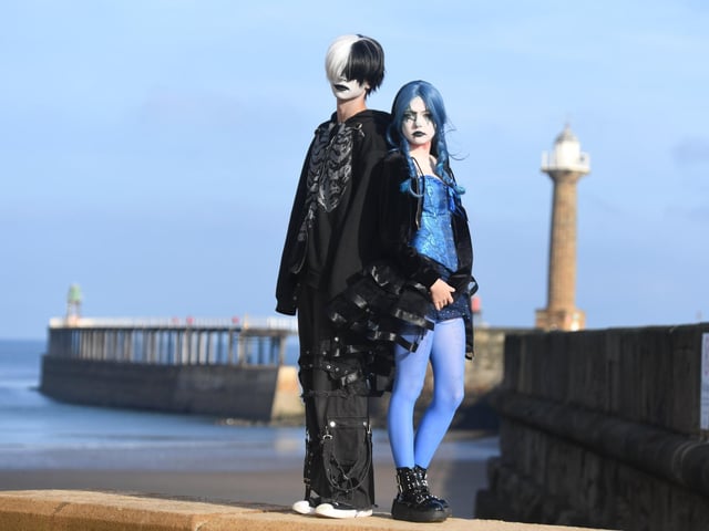 Zack Francis and Lucy Hovington by the pier in Whitby