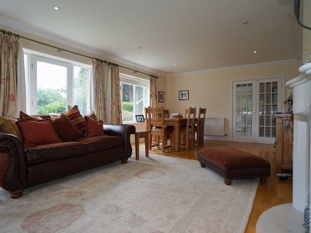 This lounge through to dining room is a large and versatile interior space.