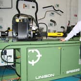Alan Pickering with one of the original Unison tube bending machines