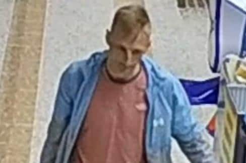 CCTV image of a man police want to speak to following a theft in Whitby.