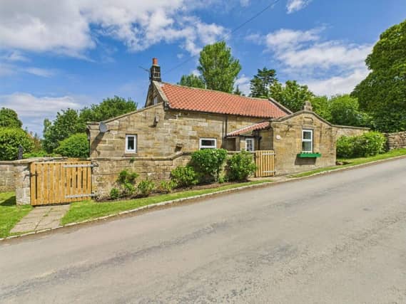 The cottage for sale in the North York Moors National Park village of Ugglebarnby.