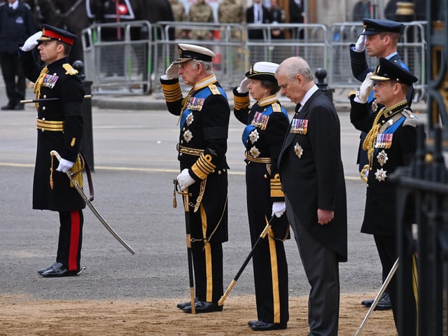 King Charles III, Princess Anne, Princess Royal, Prince Andrew, Duke of York and Prince Edward, Earl of Wessex prepare to walk behind The Queen's funeral cortege. (Photo by Geoff Pugh - WPA Pool/Getty Images)