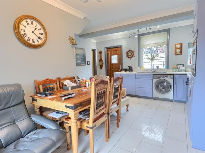 The spacious kitchen with dining area.