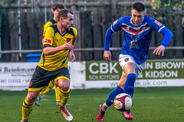 Town's Aaron Haswell in action against Workington on Saturday.
