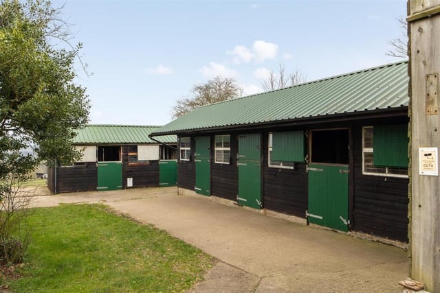 Modern stables form part of the equestrian facilities.