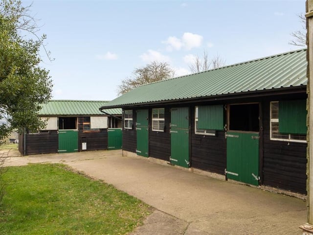 Modern stables form part of the equestrian facilities.