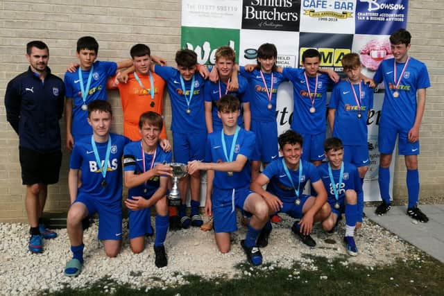 Heslerton Spiders after winning a tournament in Bridlington during the summer.