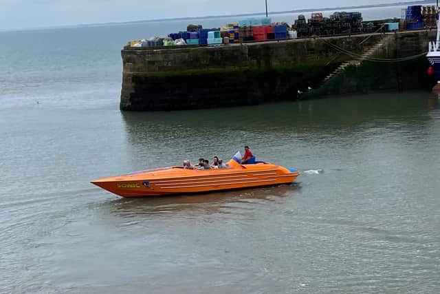 Ian Sandy frames the popular speed boat in the harbour.