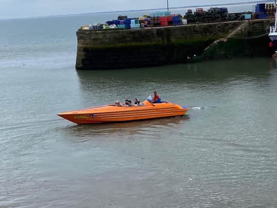 Ian Sandy frames the popular speed boat in the harbour.