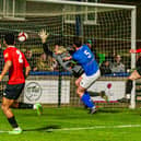 Town skipper Dan Rowe heads in the late leveller, although FC United of Manchester scored an even later winner. PHOTOS: BRIAN MURFIELD