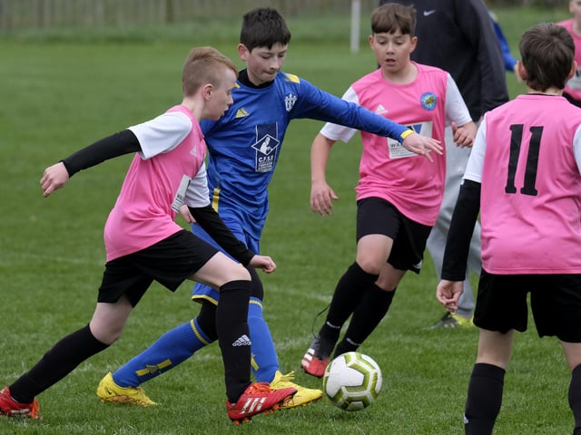 Hosts Ayton and Eastfield (blue kit) in action