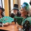 People engaging in chat at Whitby Steampunk Festival. photo: Richard Ponter